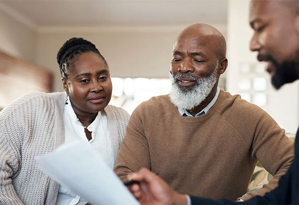 Three people discussing home-related inventory and policy